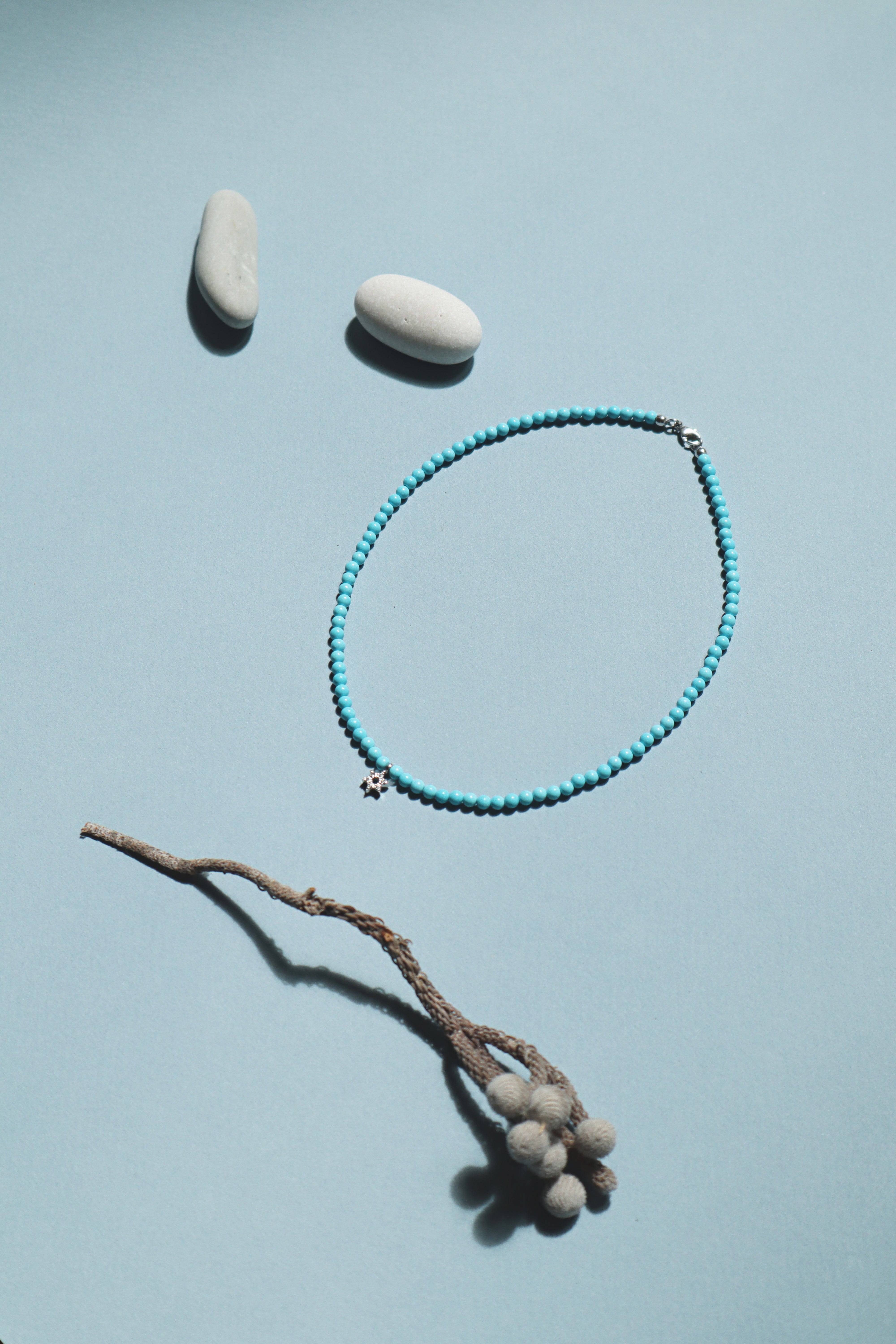 turquoise choker with small white gold diamond star of David