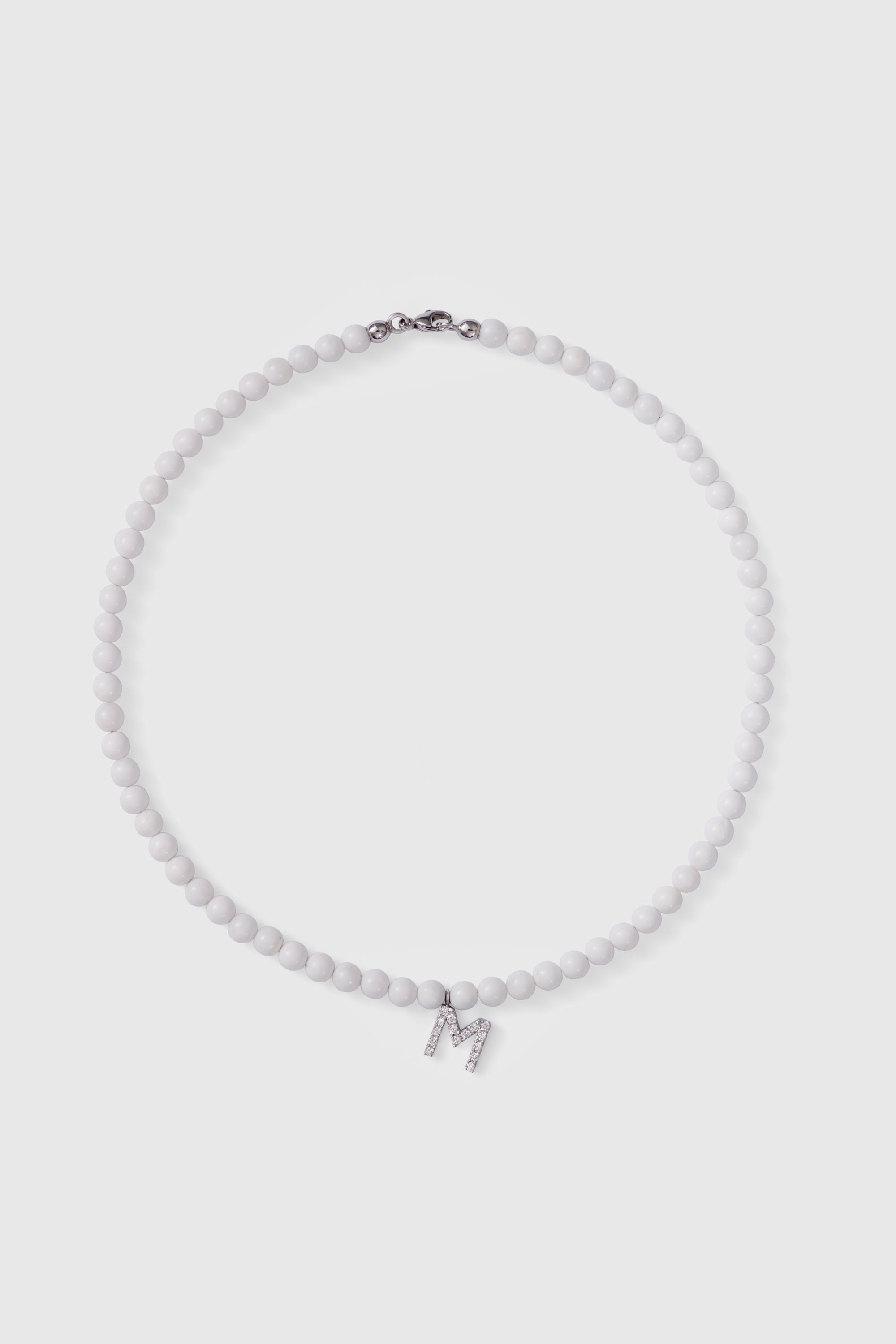 tridacna choker with white gold diamond letter