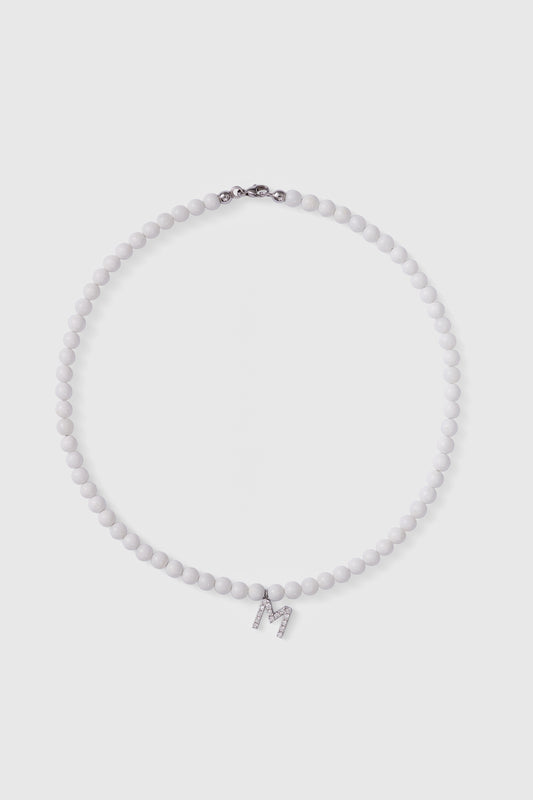 tridacna choker with white gold diamond letter