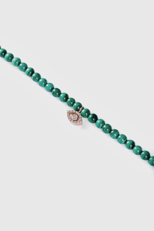 malachite choker with big pink gold diamond evil eye
